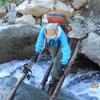 Zero crossing a river in the lower Cascades.